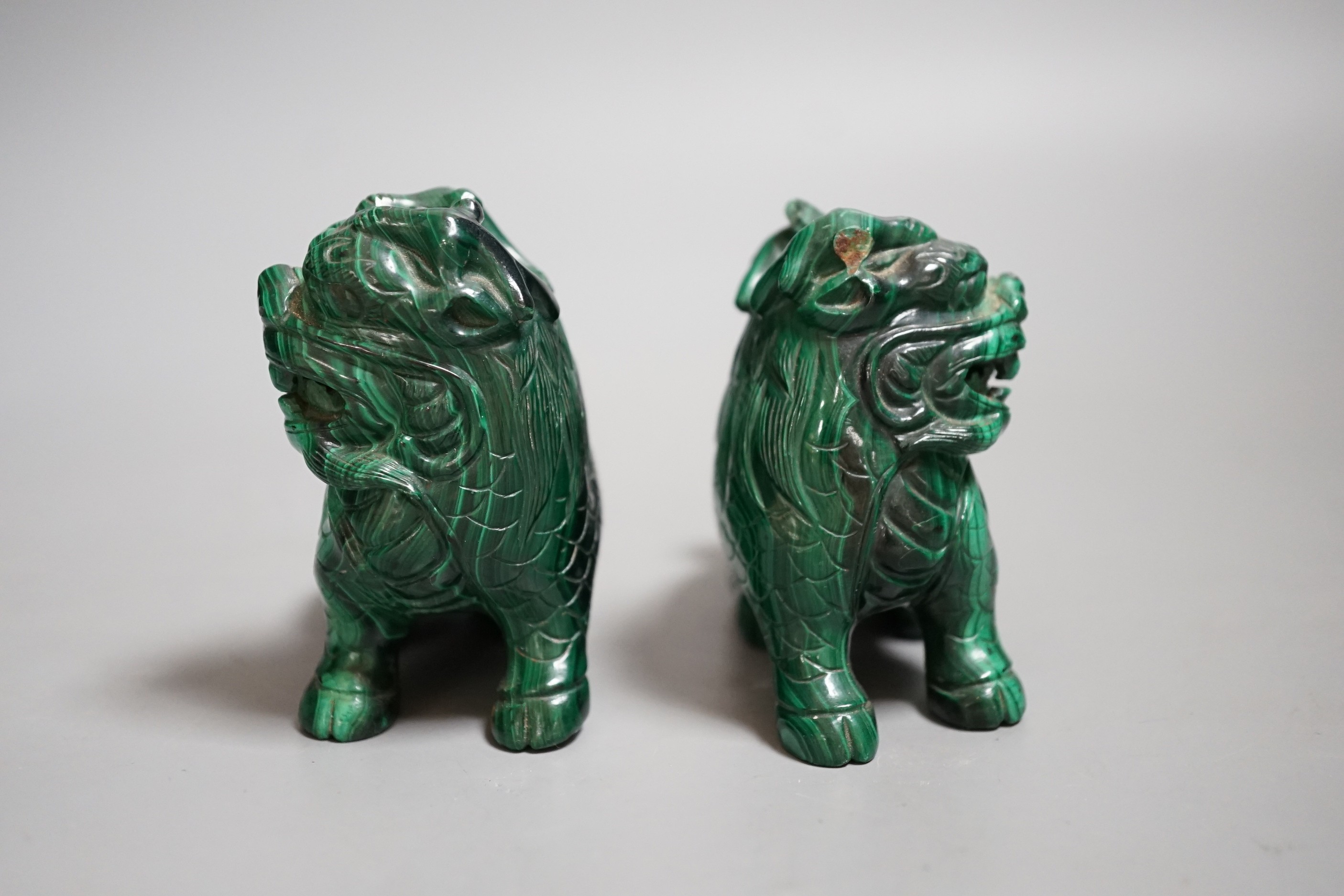 A pair of Chinese carved Lion-dog figures, 6.5cm tall